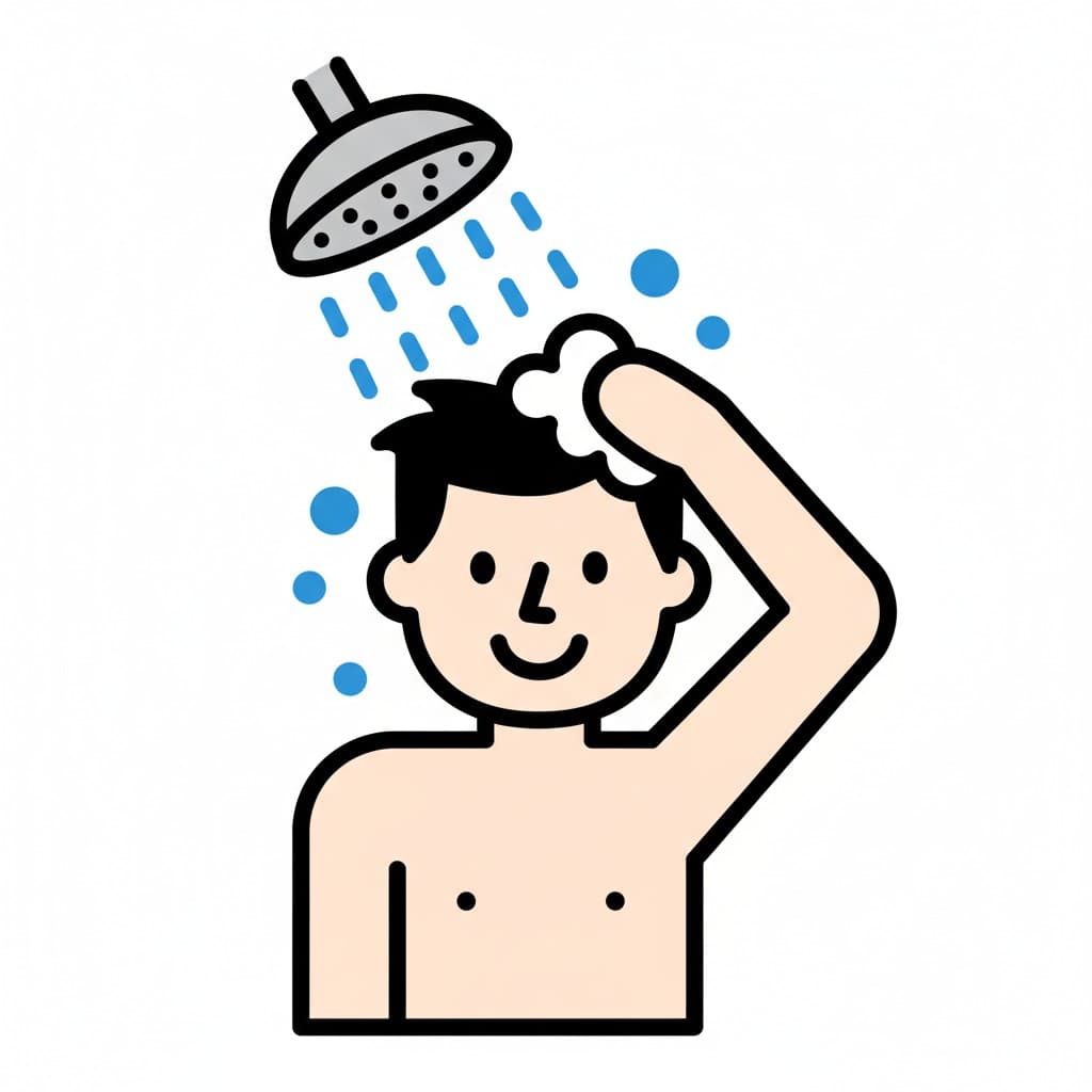 A person is taking a shower and washing their hair with soap.