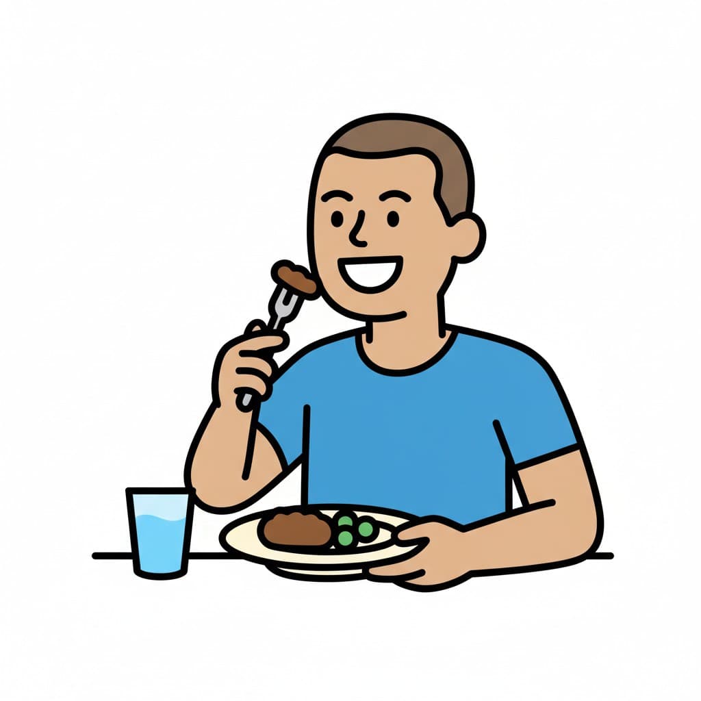 A man sitting at a table, eating dinner with a fork and a plate, with a glass of water beside him. He is smiling.