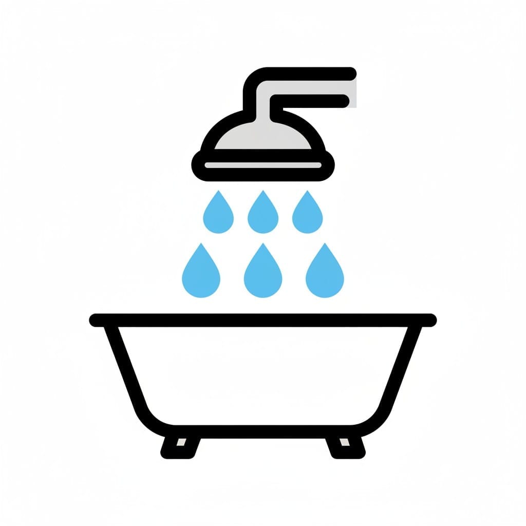 A shower head sprays water into a bathtub.